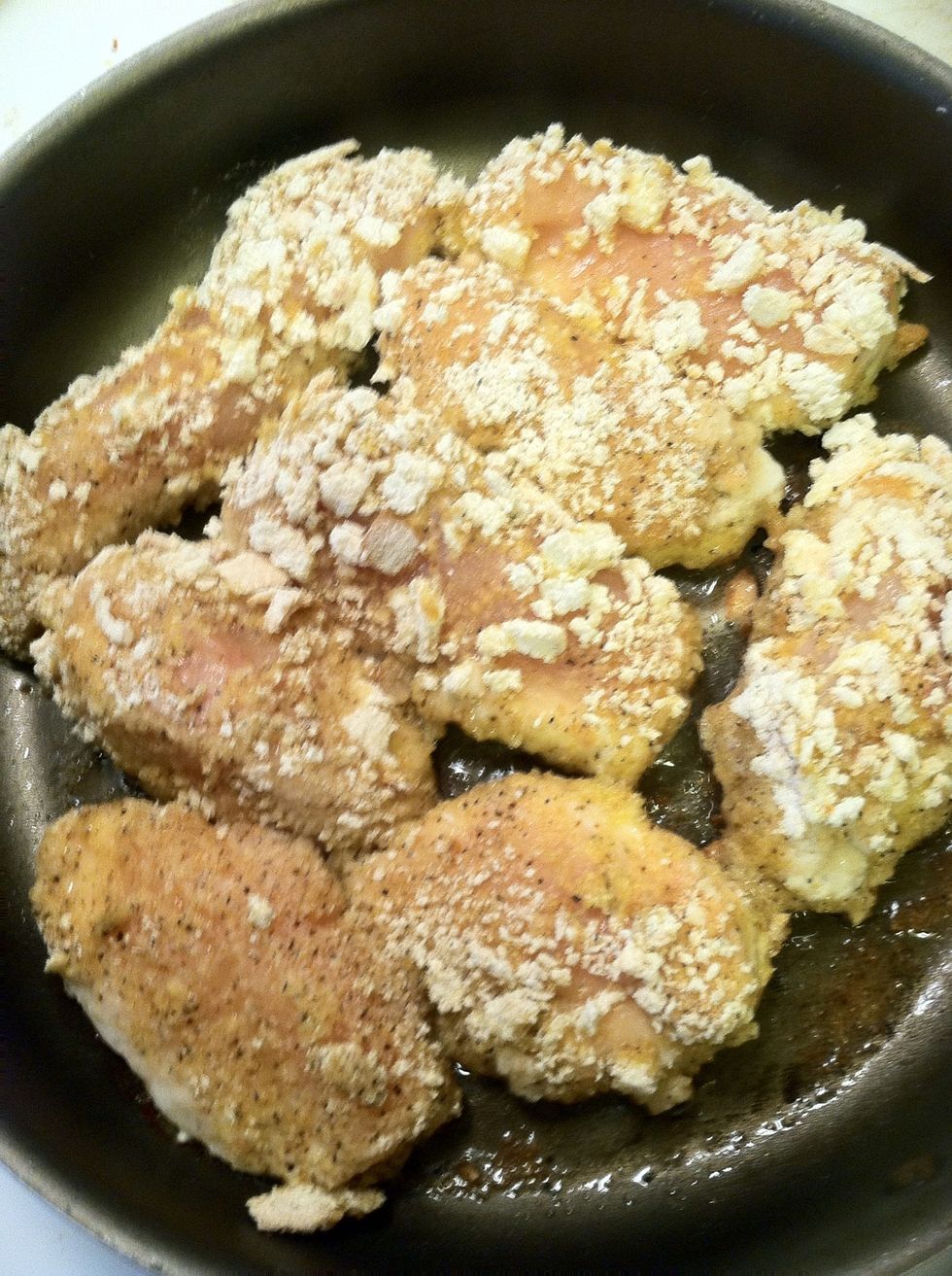 Coat in egg then bread crumbs and put in pan