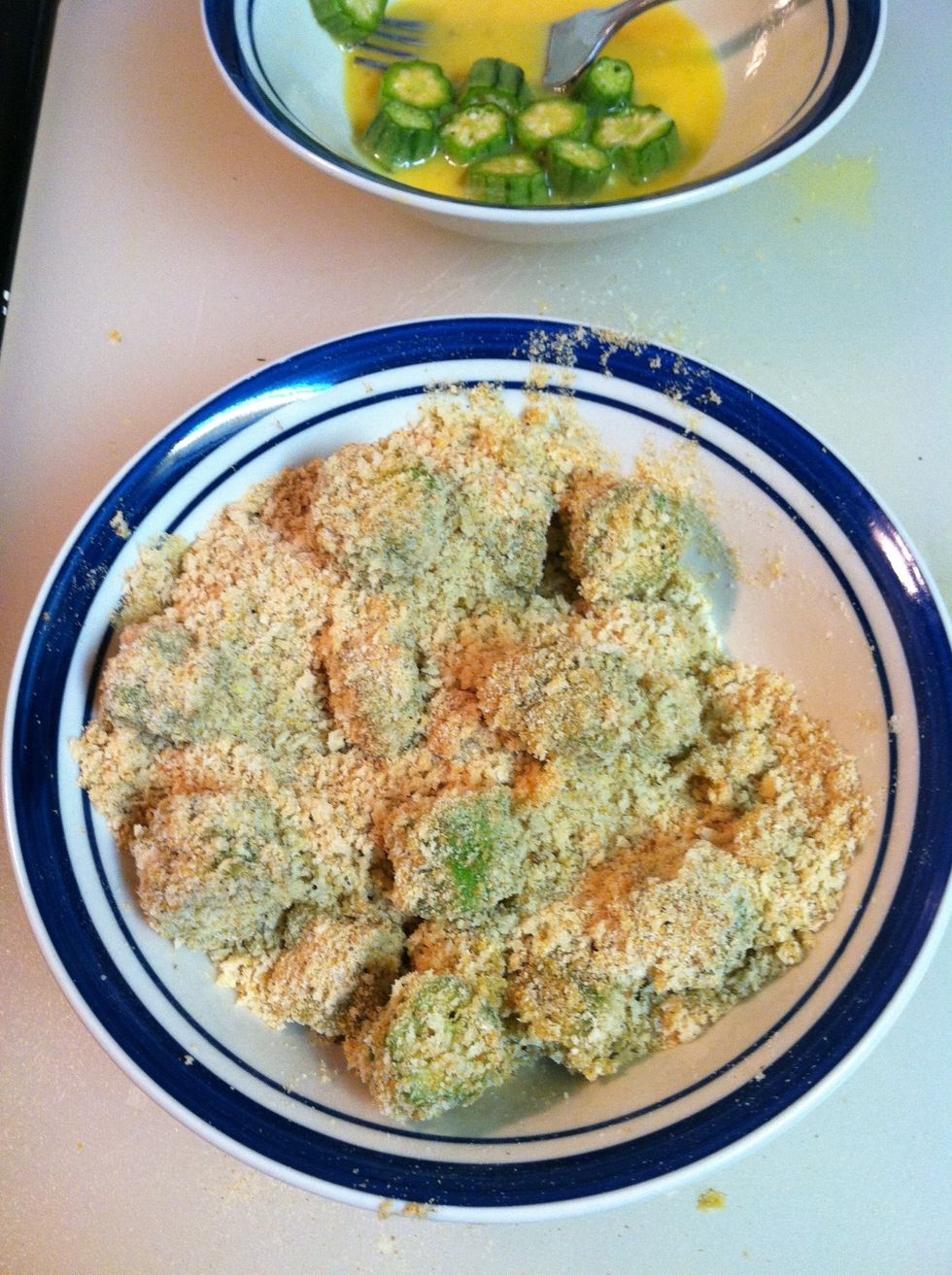 Coat soaked okra in breadcrumbs.