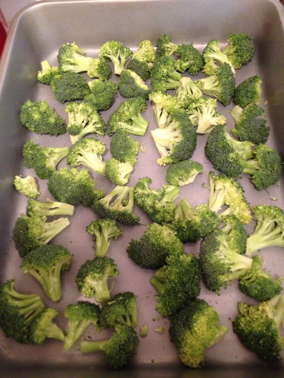 Coat the bottom of a baking pan with non-stick spray and cover it loosely with fresh, raw, pre-washedbroccoli florets. Do not wash or cook them first.