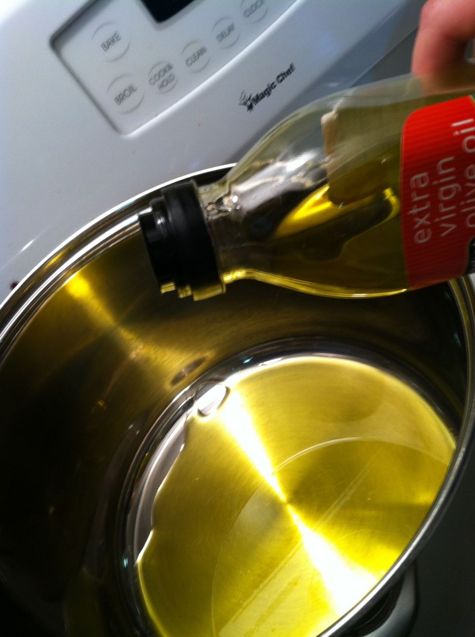 Coat the bottom of a large pan with the olive oil (1-2 tablespoons).
