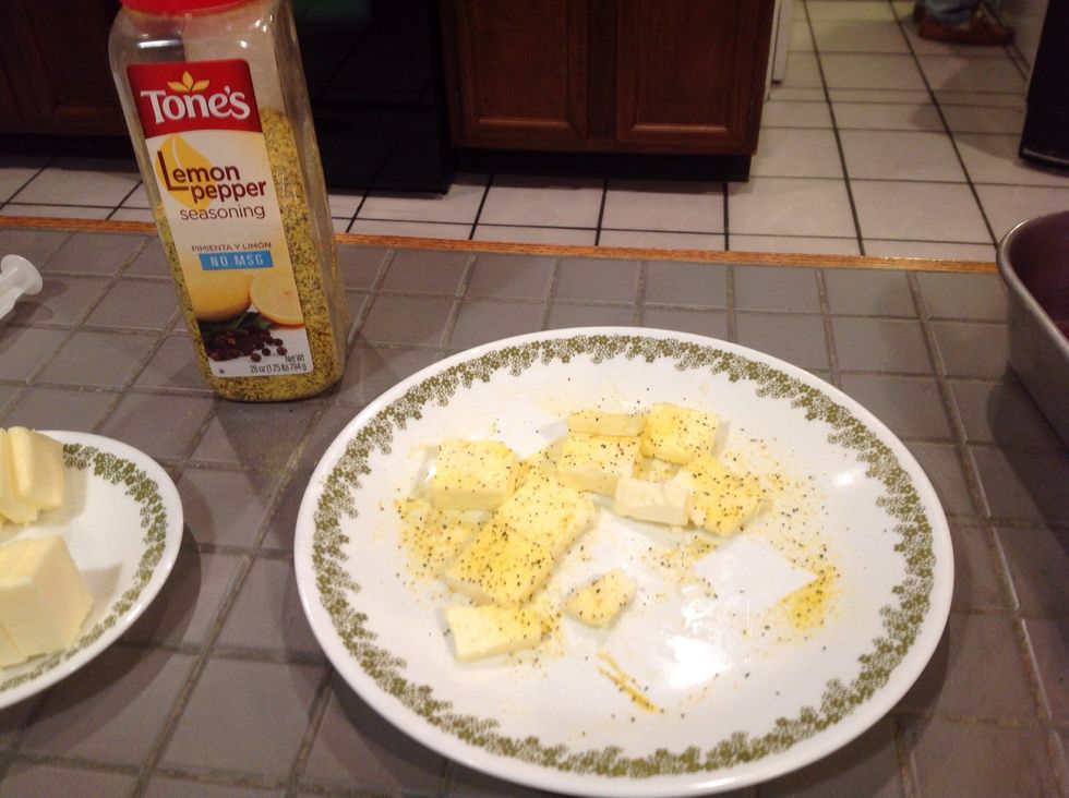 Coat the butter in lemon pepper or any desired seasoning.