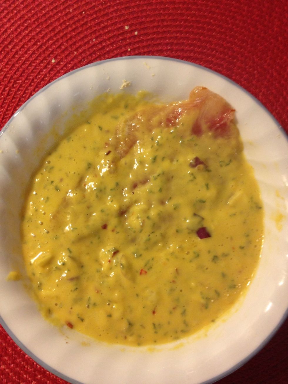 Coat the fish fillet in the chickpea batter and