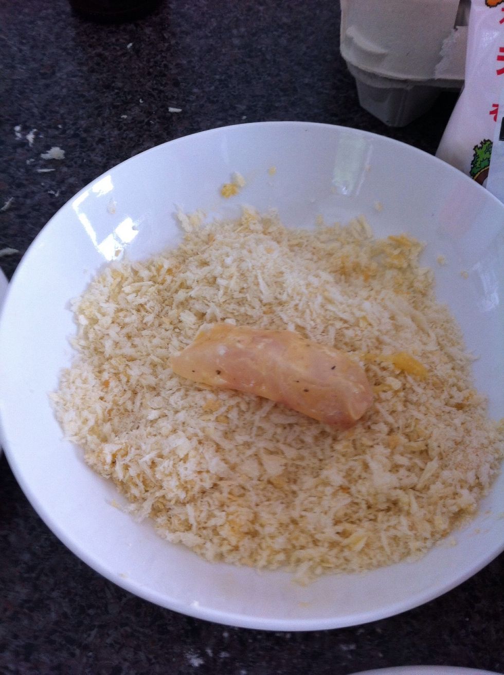 Coat the fish in bread crumbs