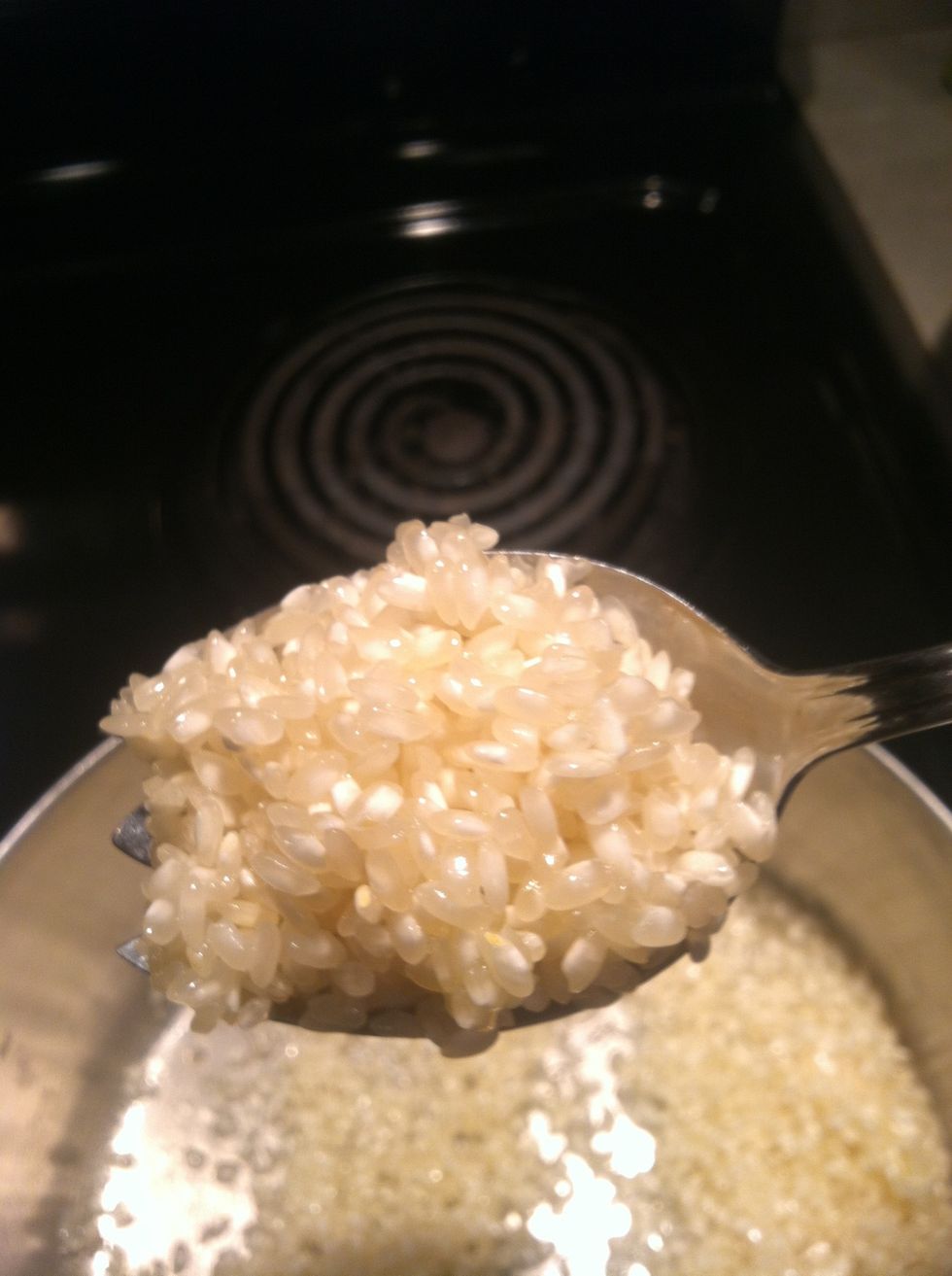 Coat the rice grains with the butter.