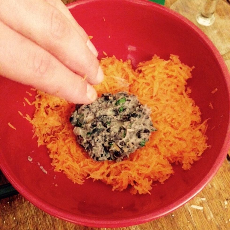 Coat them with the carrots on both sides