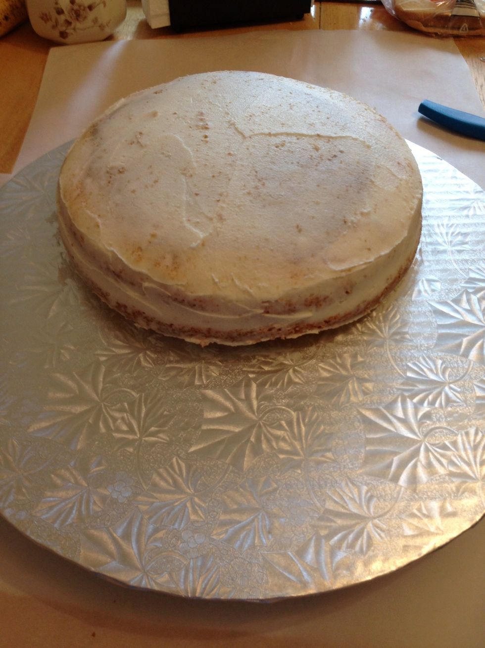 Coat with buttercream and/or ganache. I coated mine in buttercream, and then I decided that ganache might help keep everything together and smooth, so I tried it for the first time, and LOVE it!!