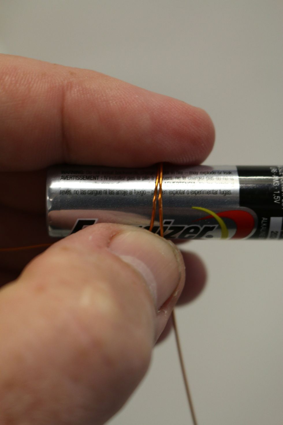 Coil it around until you have about 2" left.