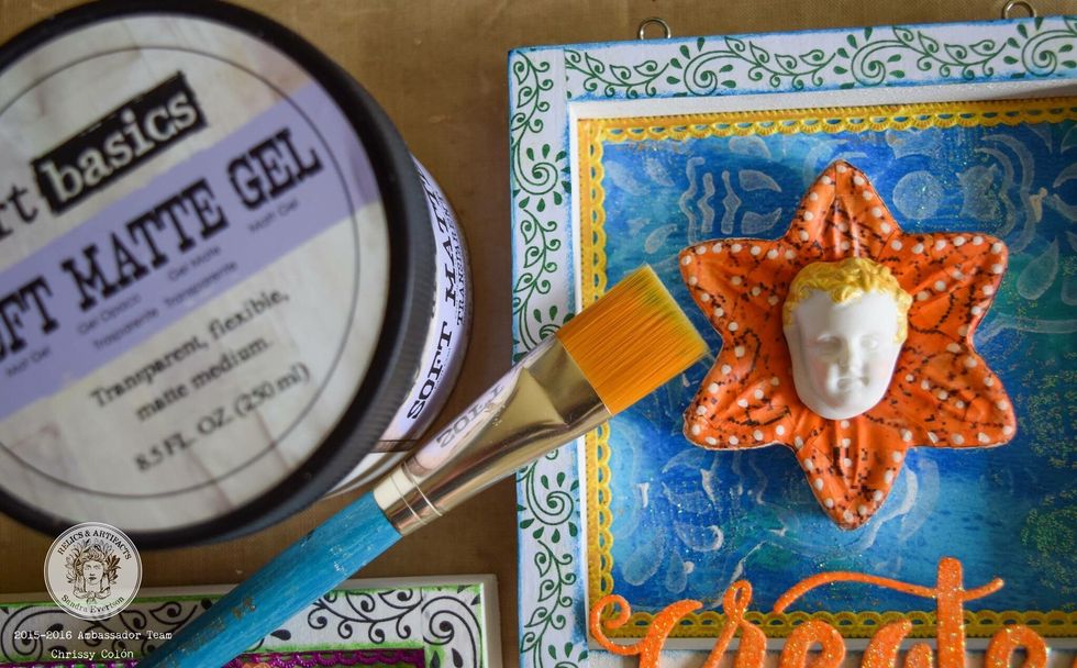 Collage frames and Relics & Artifacts\u00ae pieces using gel medium and desired papers.