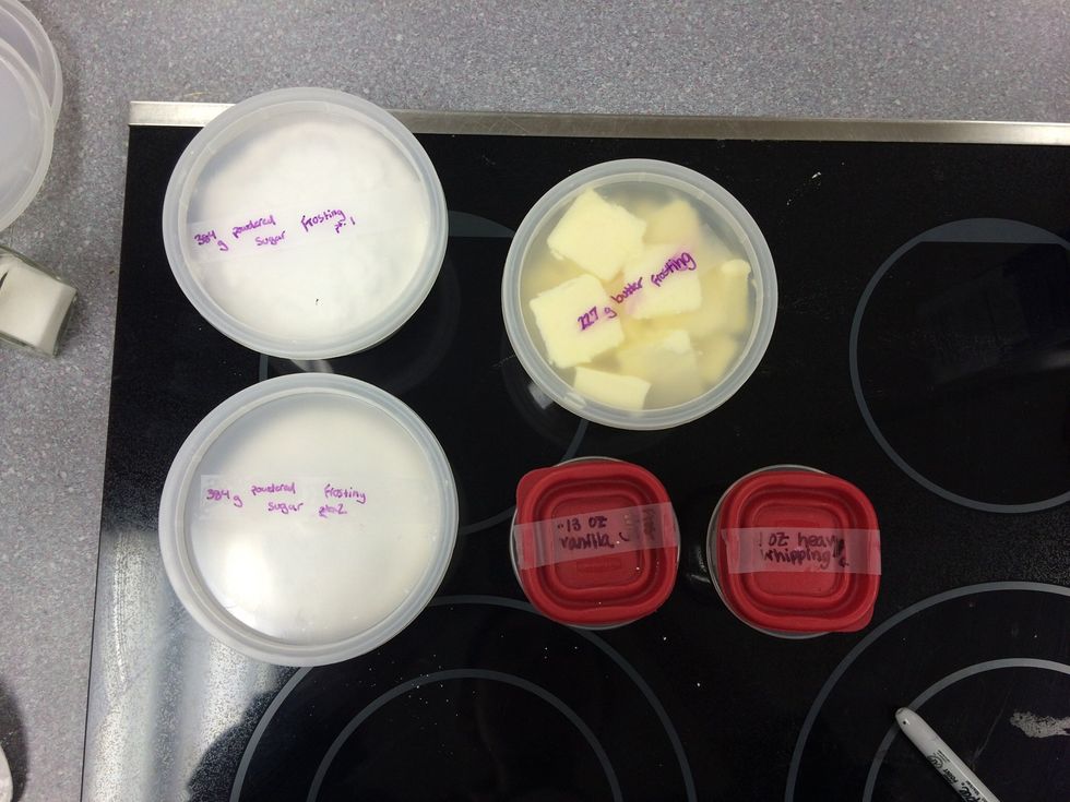 Collect ingredients for the vanilla buttercream frosting. (384 g confectioners' sugar, 227 g butter, .13 oz vanilla extract, and 1 oz of heavy whipping cream)