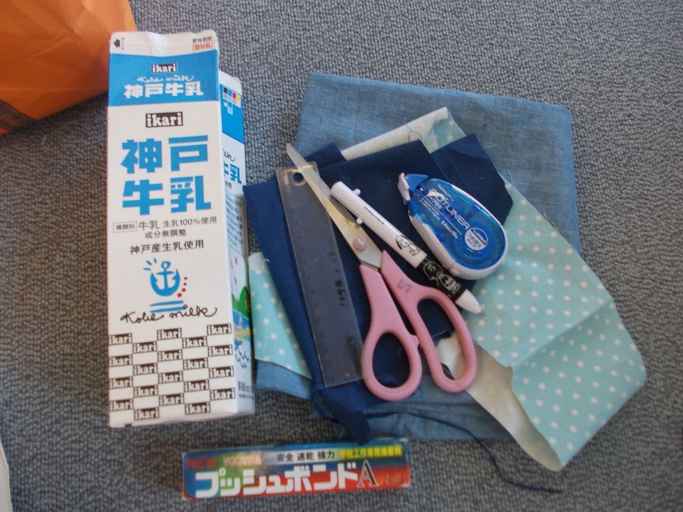 Collect the materials : Milk carton (3), Bond, Scissors, Cloth, Pen and a Ruler.