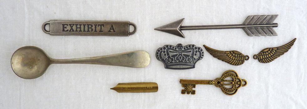 Collect together ephemera and embellishments to add to the frames. Some metal pieces.