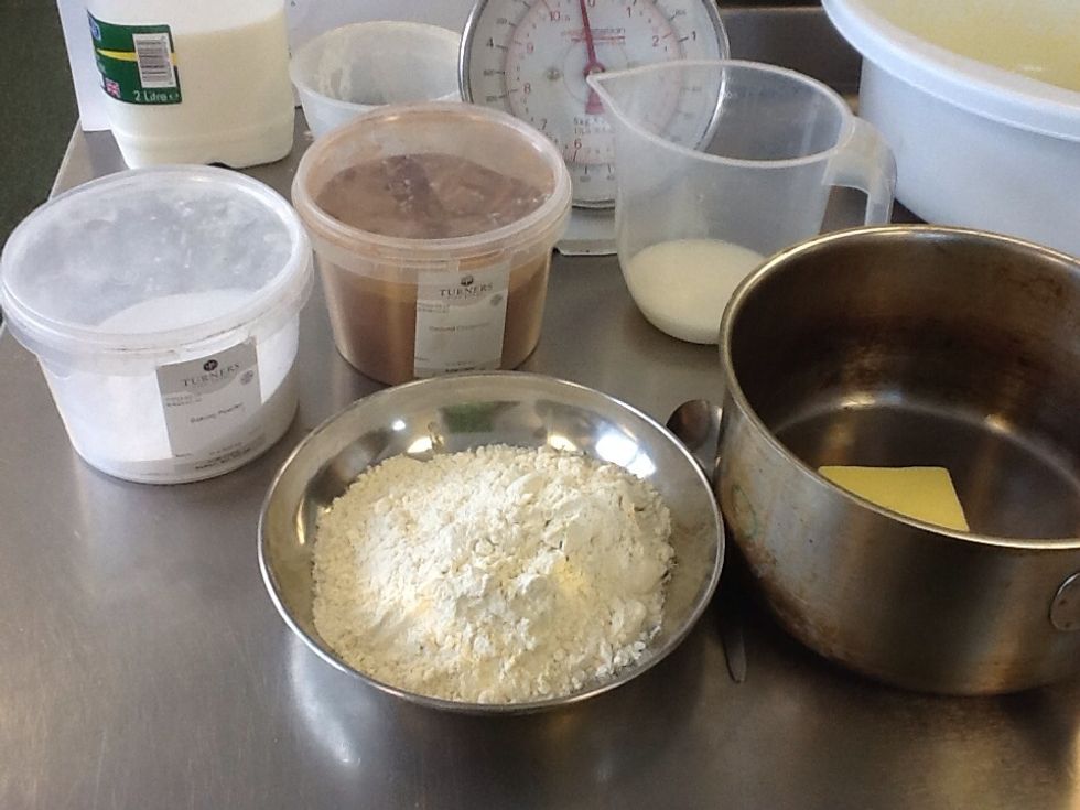 Collect your baking powder, cinnamon, milk, plain flour and butter
