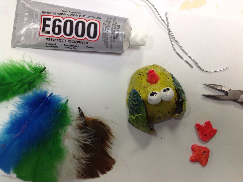 Collect your feathers and wire. I'm using E6000 adhesive, but I think the feathers would stay put without it. Hot glue would be a good alternative.
