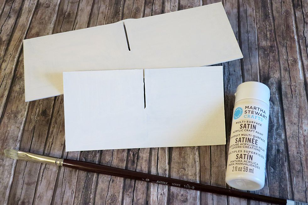Color the chipboard pieces with an acrylic paint.
