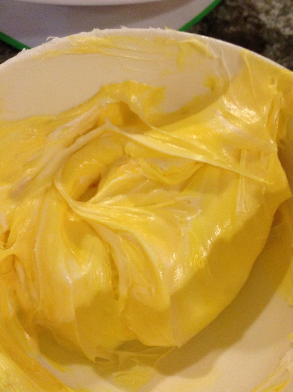 Color the frosting. I did four colors in four separate bowls. I had about 3/4 a cup of frosting in each bowl