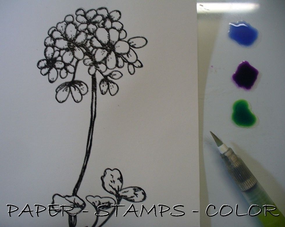 Color the stamped image with Minx inks and a waterbrush. Leave to dry.