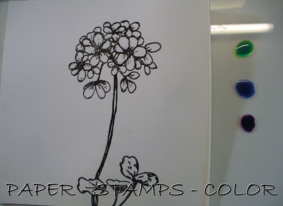 Color the stamped image with the same colors used for the background.