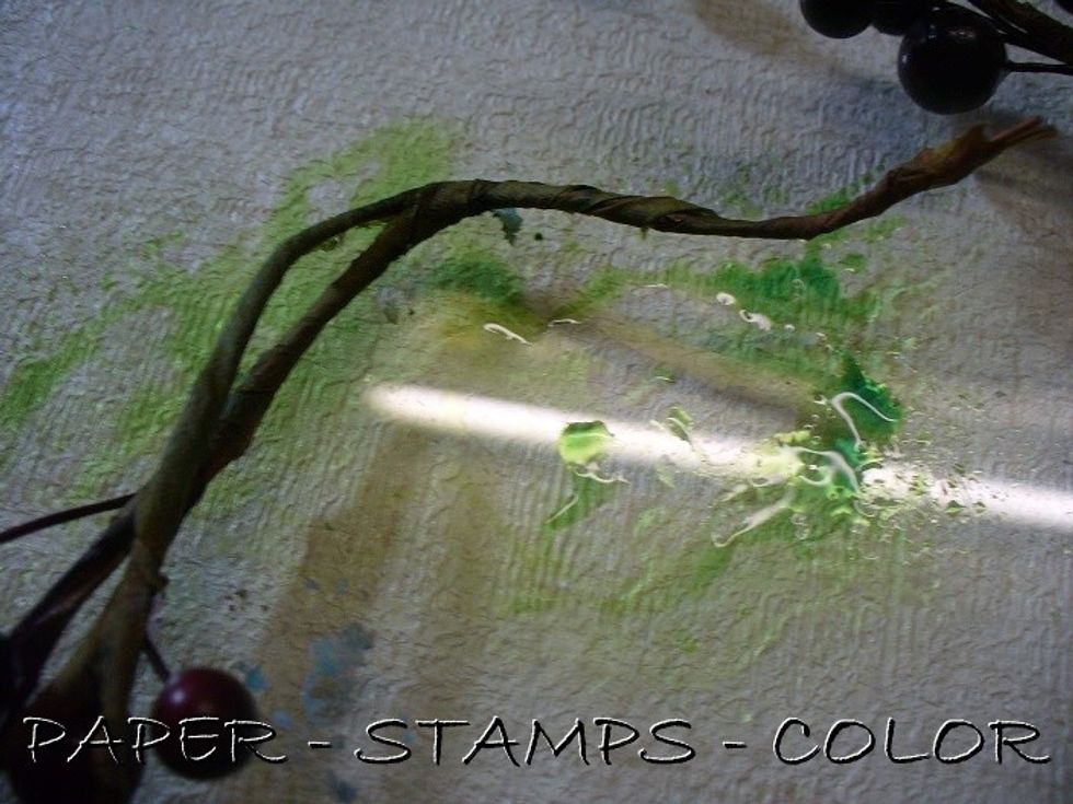 Color the stems with Colorations Grass inkspray, and quickly dry it with a heatgun; the paper is very soft!