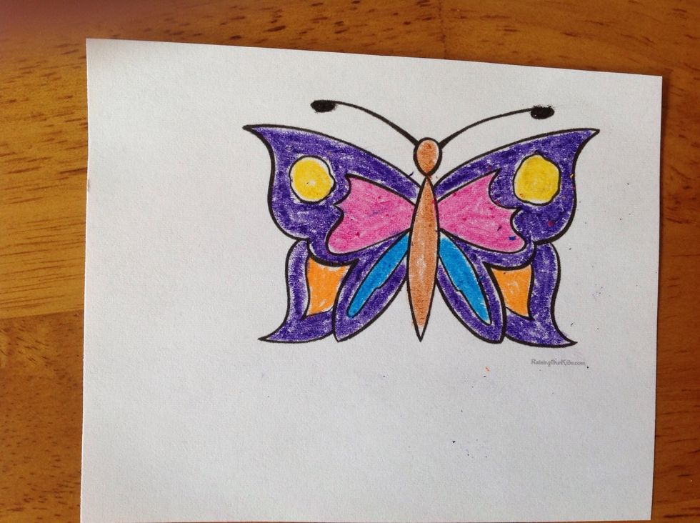 Color your butterfly template. Make sure to color it symmetrically. Then, cut it out.