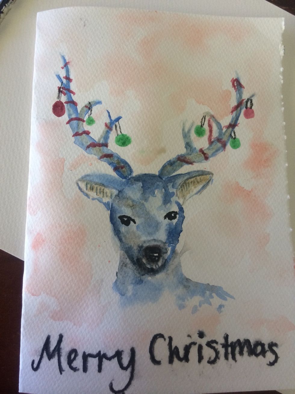 Colour background and if wanted decorate the antlers and write merry christmas the card is now done