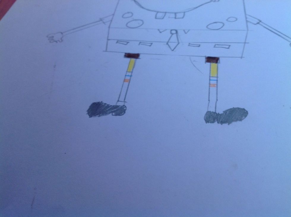 Colour in the shoes with black.do two line one in blue the other in red. Colour in the skin yellow and the the shorts legs in a brown