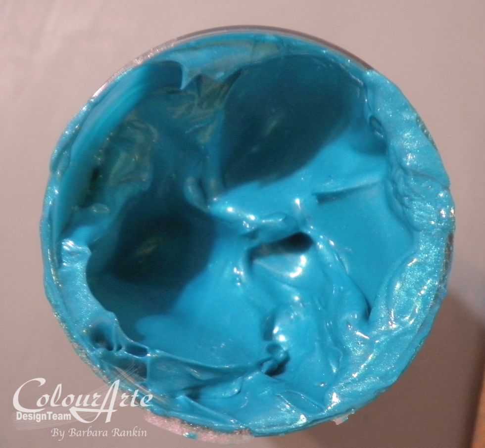 ColourArte Radiant Gels dimensional paint is very thick and gives a beautiful, shimmery dimension when added through the stencil.