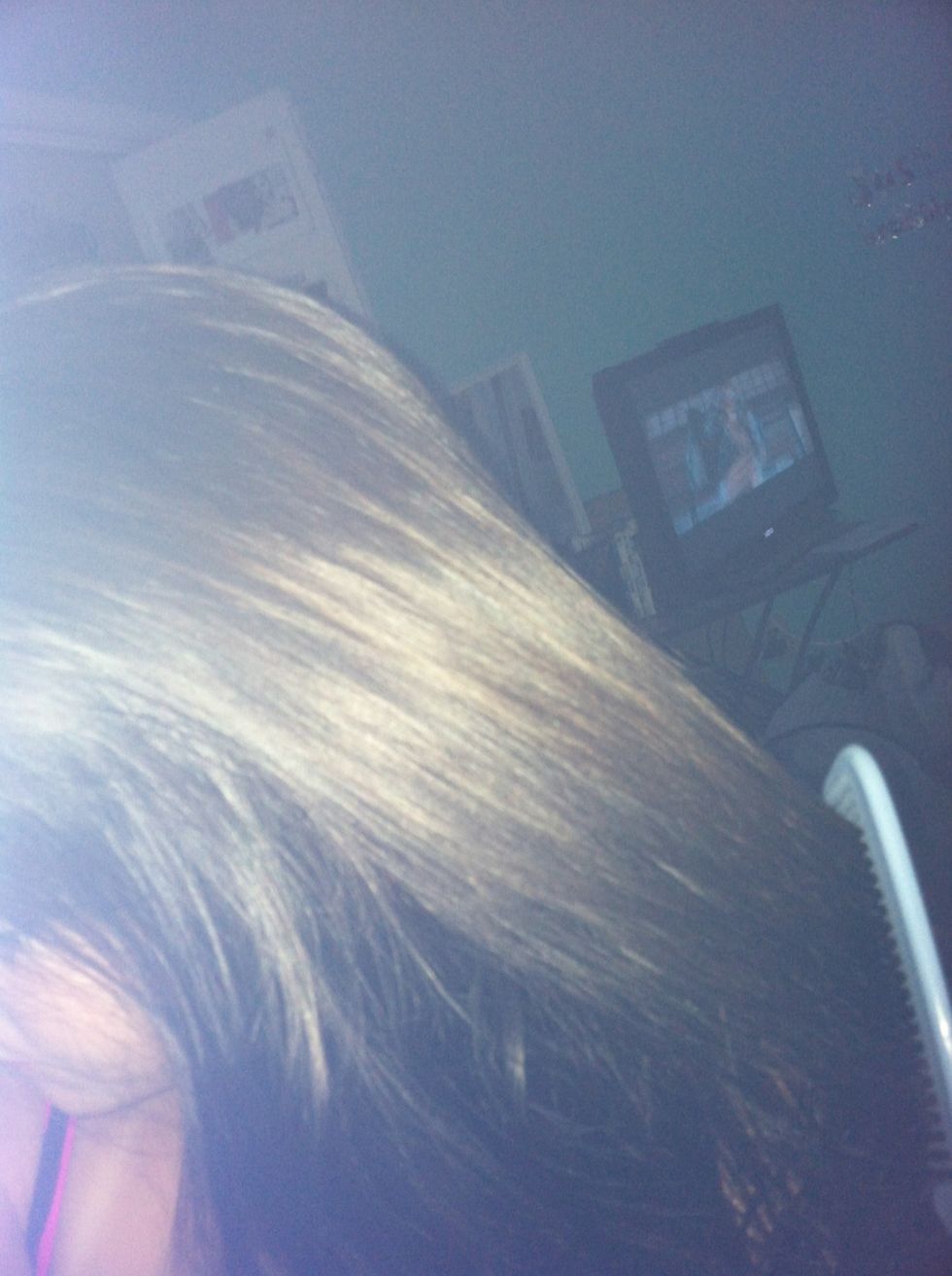 Comb hair with a comb, a wide tooth comb is best (brushing hair with a brush while hair is wet is damaging and causes split ends).