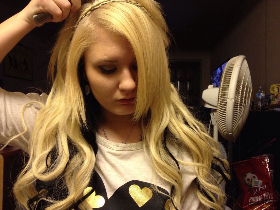 Comb over the hair you had teased just to tame it to your liking.