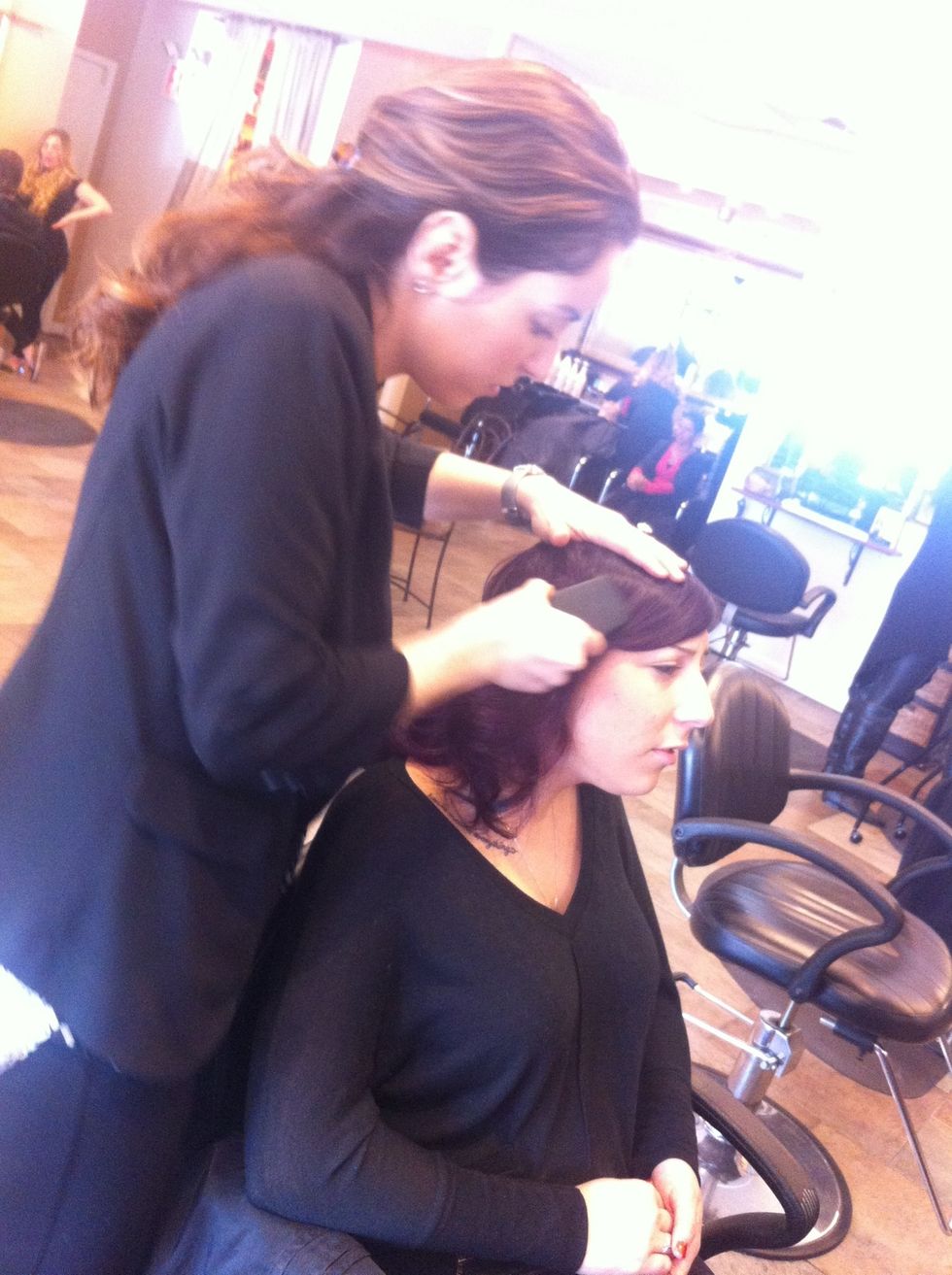 Comb set out while at the same time shaping the front into finger wave like pattern...