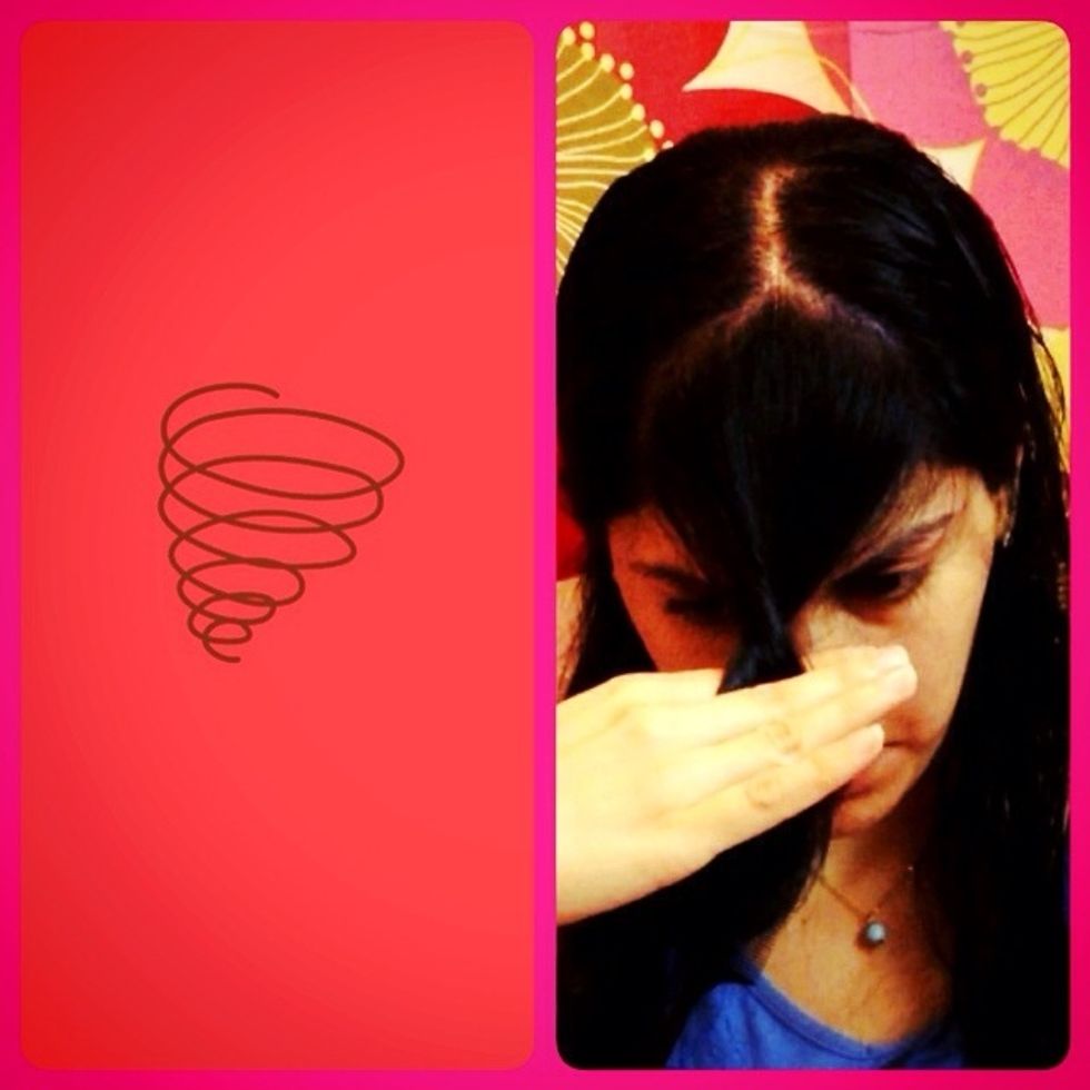 Comb the hair, then warp it half a role around you hand.\u21aa