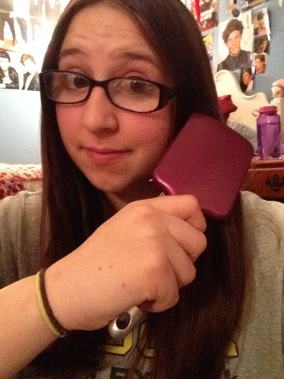 Comb through hair and make sure it's a little damp