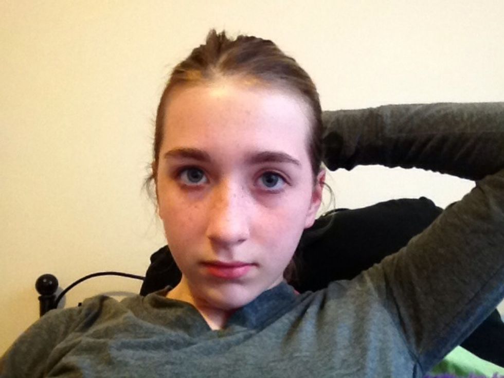 Comb your hair back like you would a pony tail