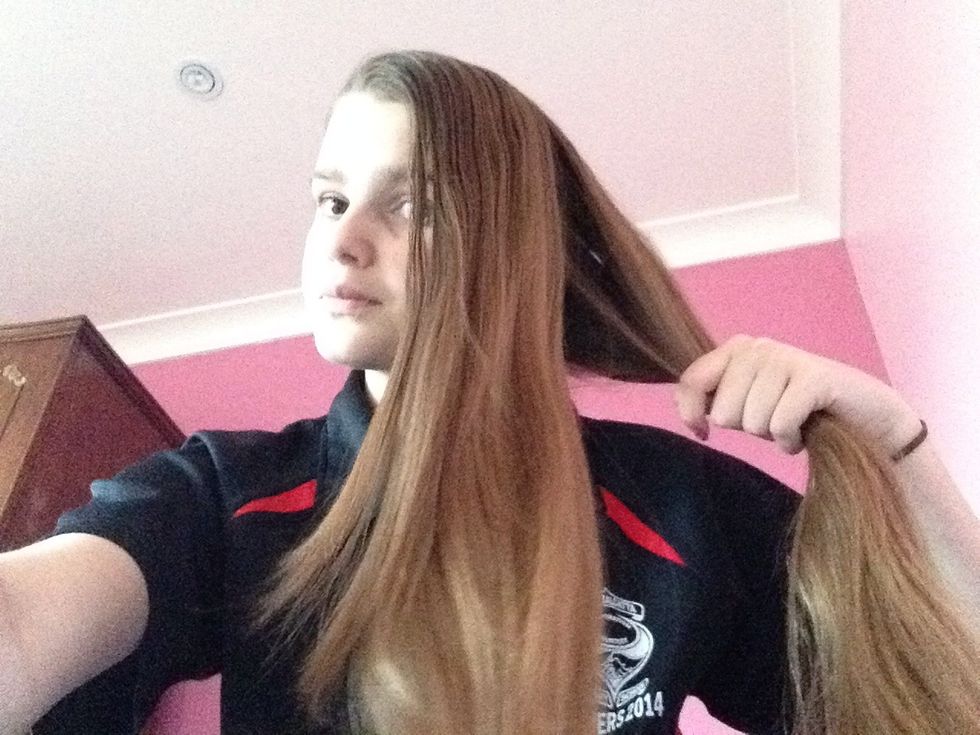 Comb your hair over to the side and seperate your hair in half.