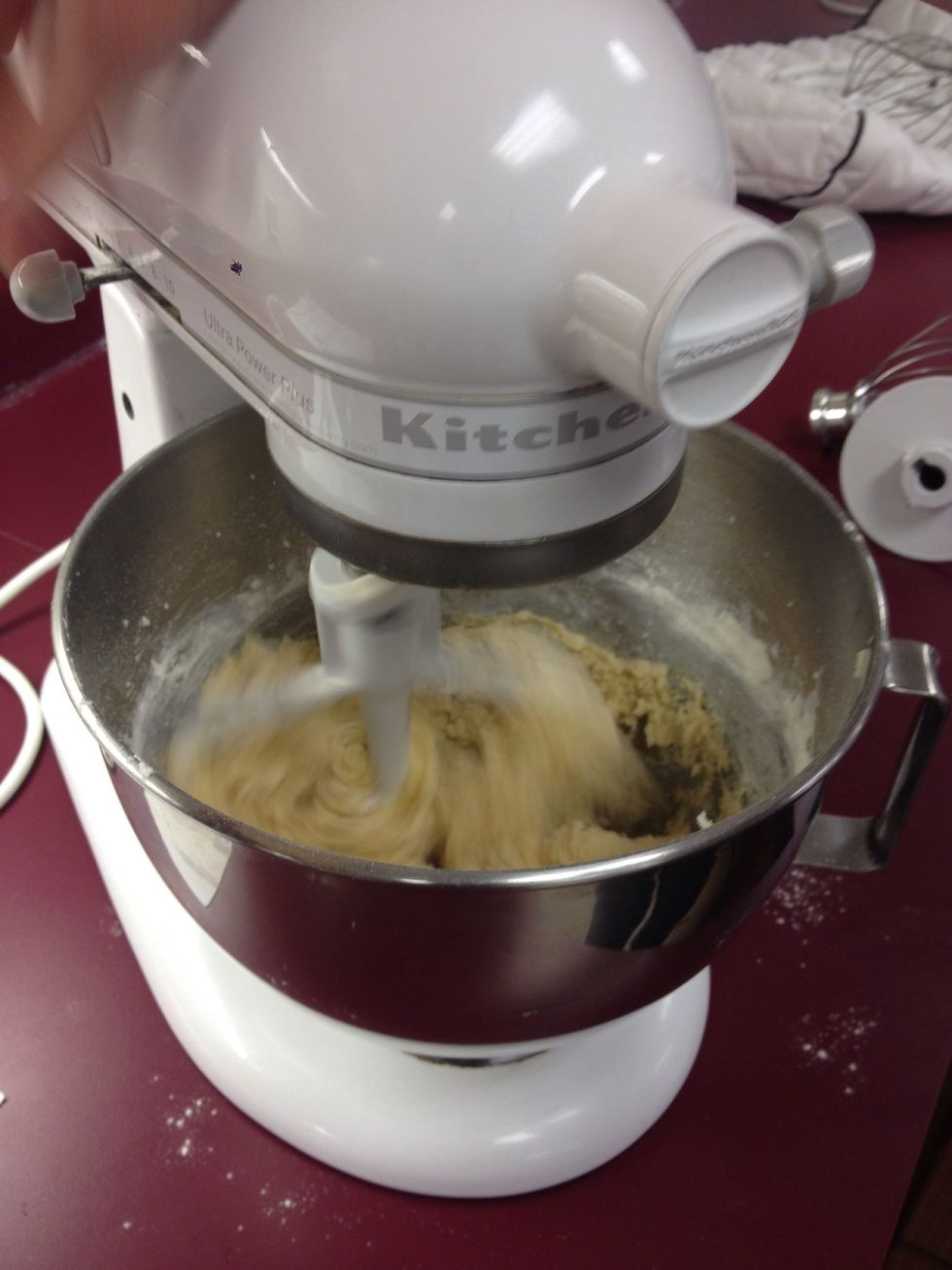 Combine 1 1/3 cups all purpose flour, 3/4 teaspoon baking powder and 1/4 teaspoon salt in a bowl and mix the dry ingredients thoroughly into butter mixture