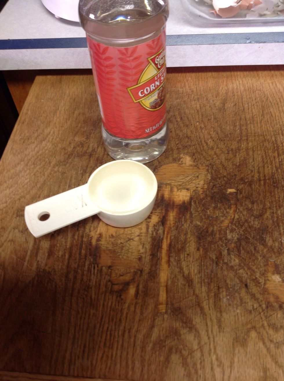 Combine 1/4 cup light corn syrup.