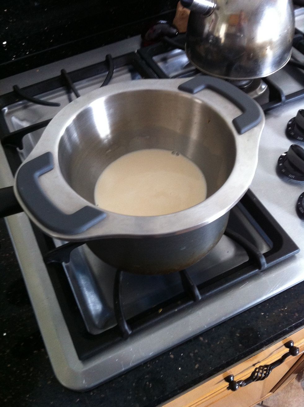 Combine 1 tbs coffee, 1/4 cup half and half, 1/4 cup milk, 1 tbs sugar, and 1/4 tsp of vanilla extract in a double boiler. (If u don't have a double boiler just use a pot)