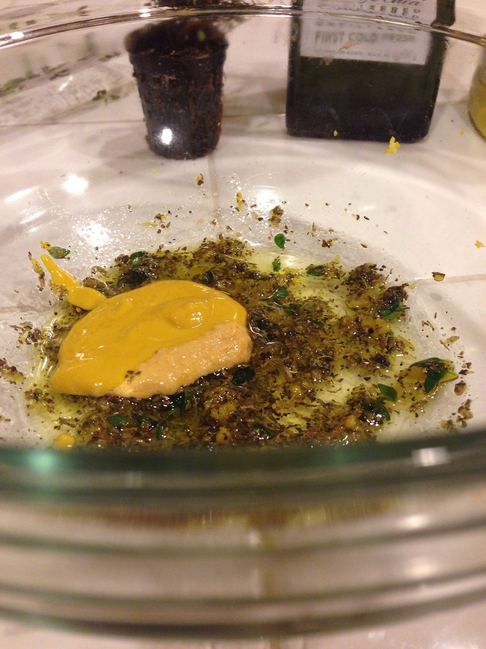 Combine 1 Tbsp olive oil, 1/4 tsp salt, 1/2 tsp thyme (I used fresh), 1 1/2 tsp oregano, 1 tsp lemon zest, 1/4 tsp kosher salt, and 1 tbsp mustard (I used mostly yellow, and added a tad of hot)