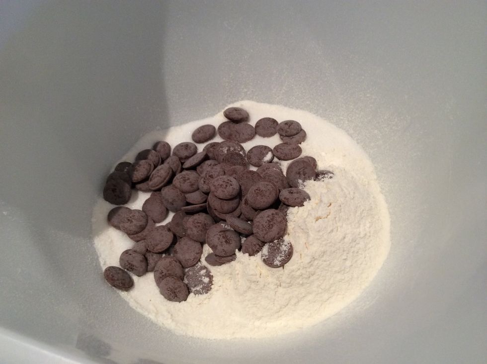 Combine 2 Cups Of Self-Raising Flour (Sifted), 1/2 A Cup Of Sugar And 1/2 A Cup Of Chocolate Bits