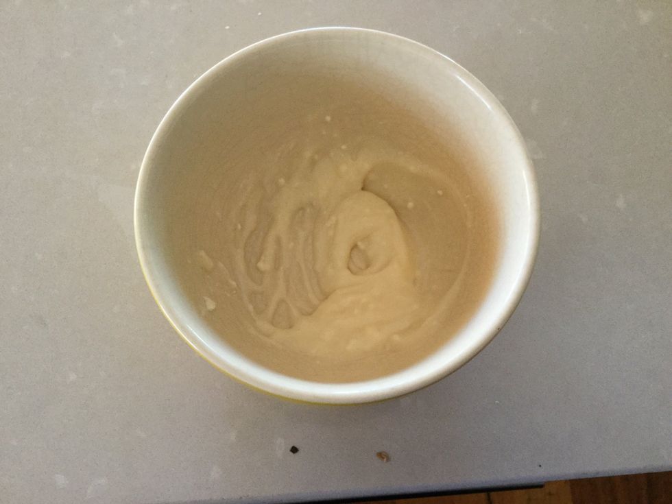 Combine 2 teaspoons of yoghurt and 2 tablespoons of icing sugar in a small bowl