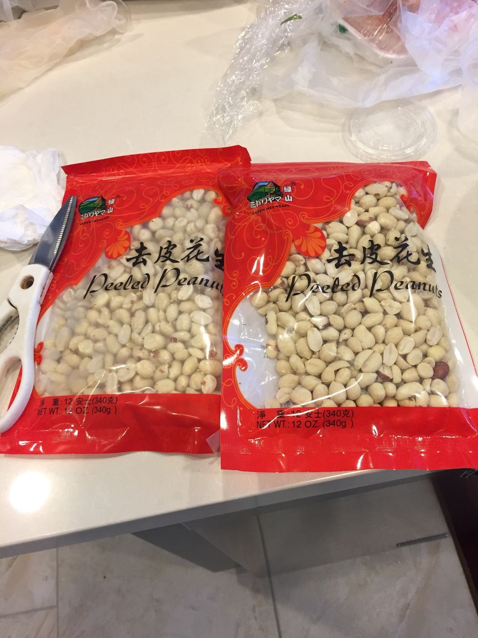 Combine 24 ounces (two 12 ounce bags) of raw peanuts with egg white