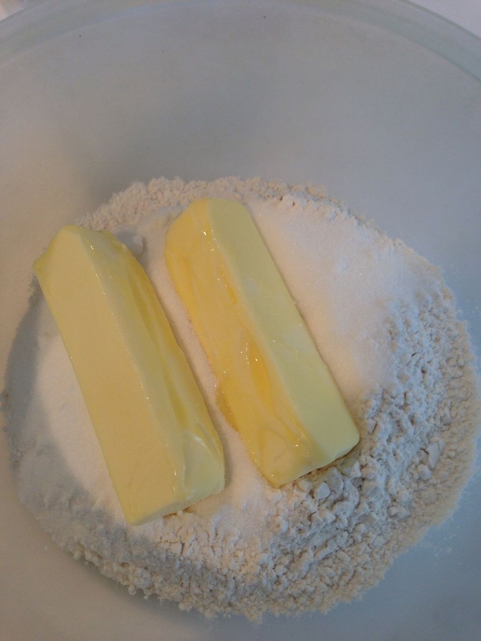 Combine all ingredients except the jelly and powdered sugar in a large bowl.