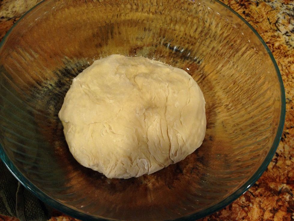 Combine all ingredients with yeast mixture and knead for a few minutes. Cover with plastic wrap and allow dough to rise overnight in the refrigerator.