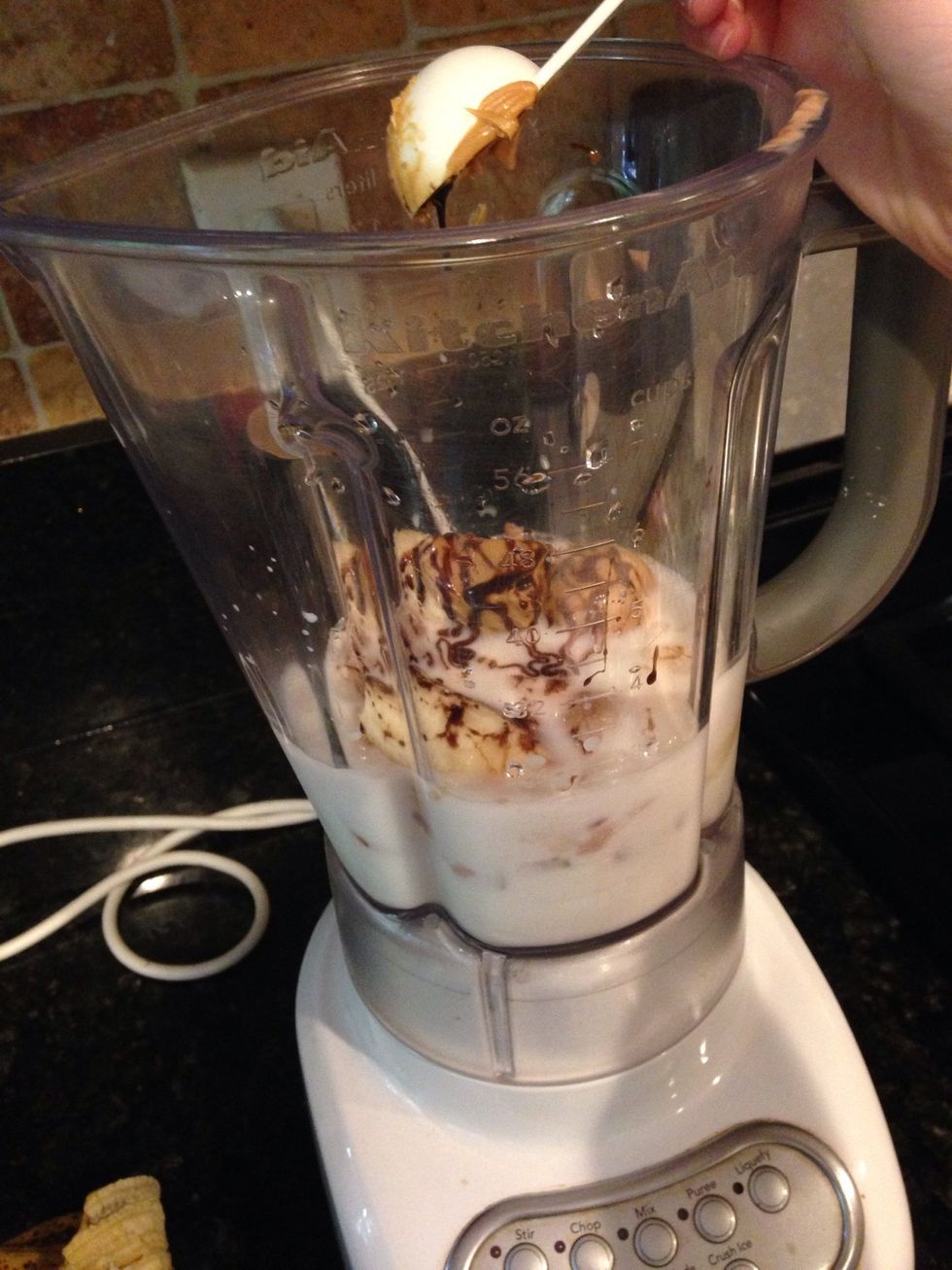 Combine all of the ingredients into a blender. It may look gross now, but it'll be delicious in only a few moments!