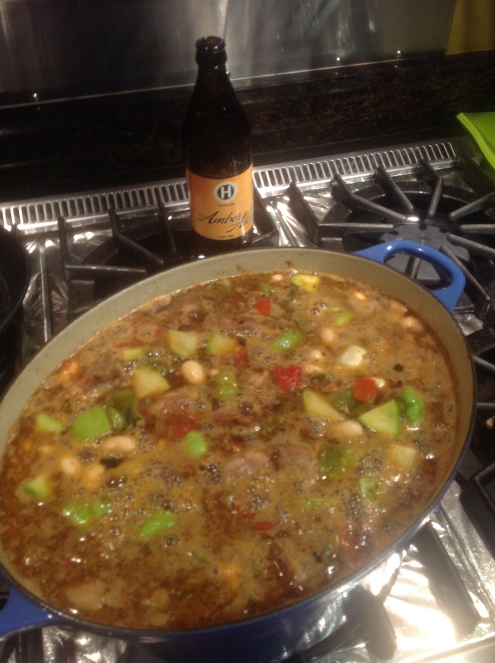 Combine all spices and remaining ingredients including beans with liquid cover and cook for 1 1/2 to 2 hours.