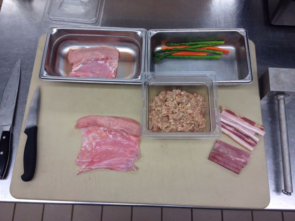 Combine and grind all ingredients except the saddle, asparagus, carrot, bacon, and coppa batons. Use a coarse die on your meat grinder. Lay out saddle inside up and pound out belly with a flat mallet.