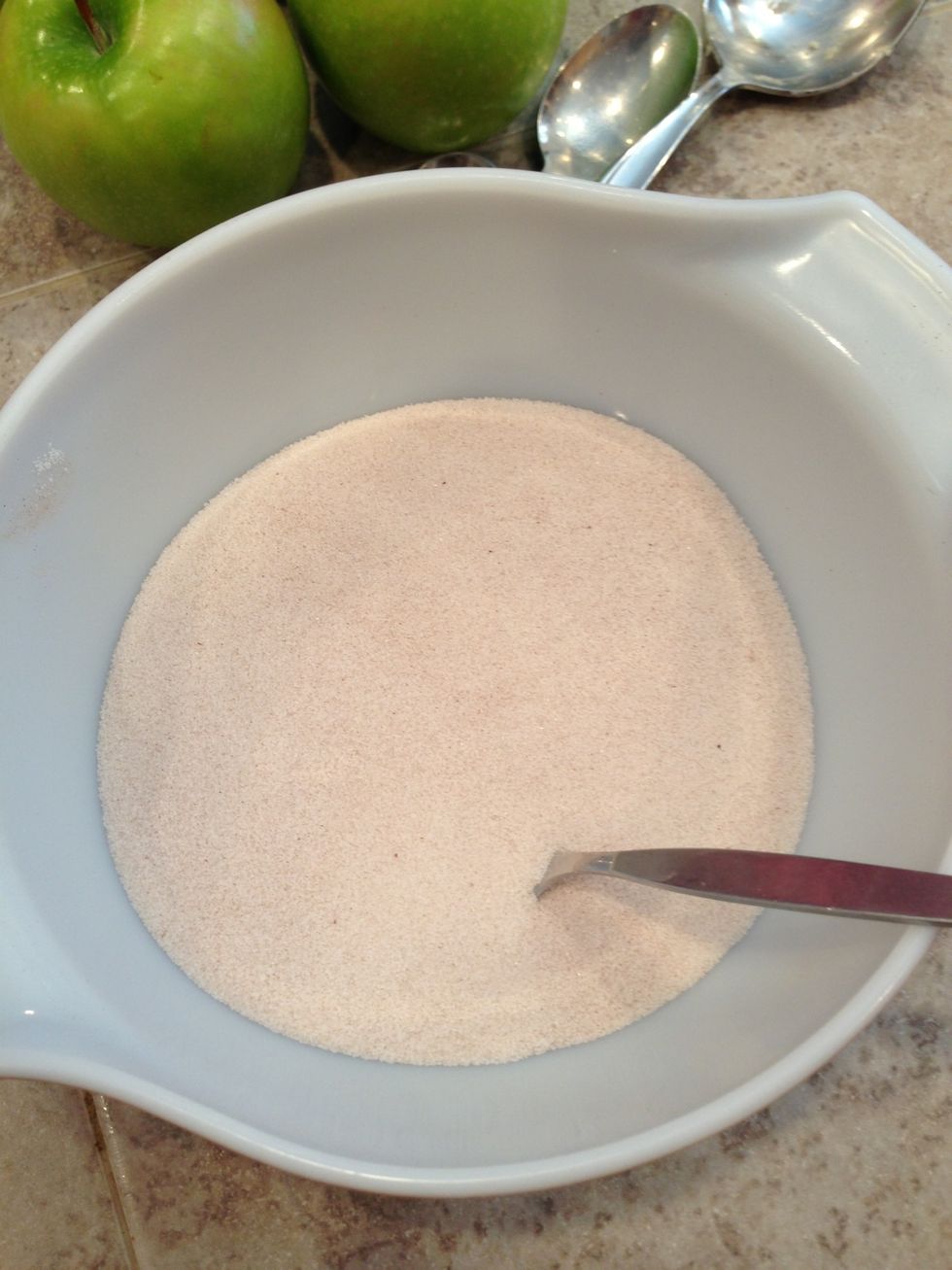 Combine cinnamon and sugar.