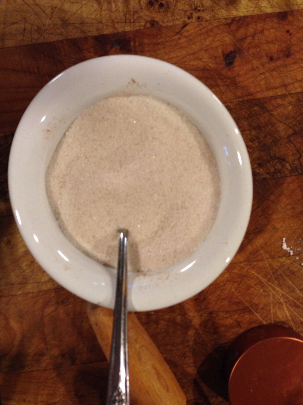 Combine cinnamon and sugar.