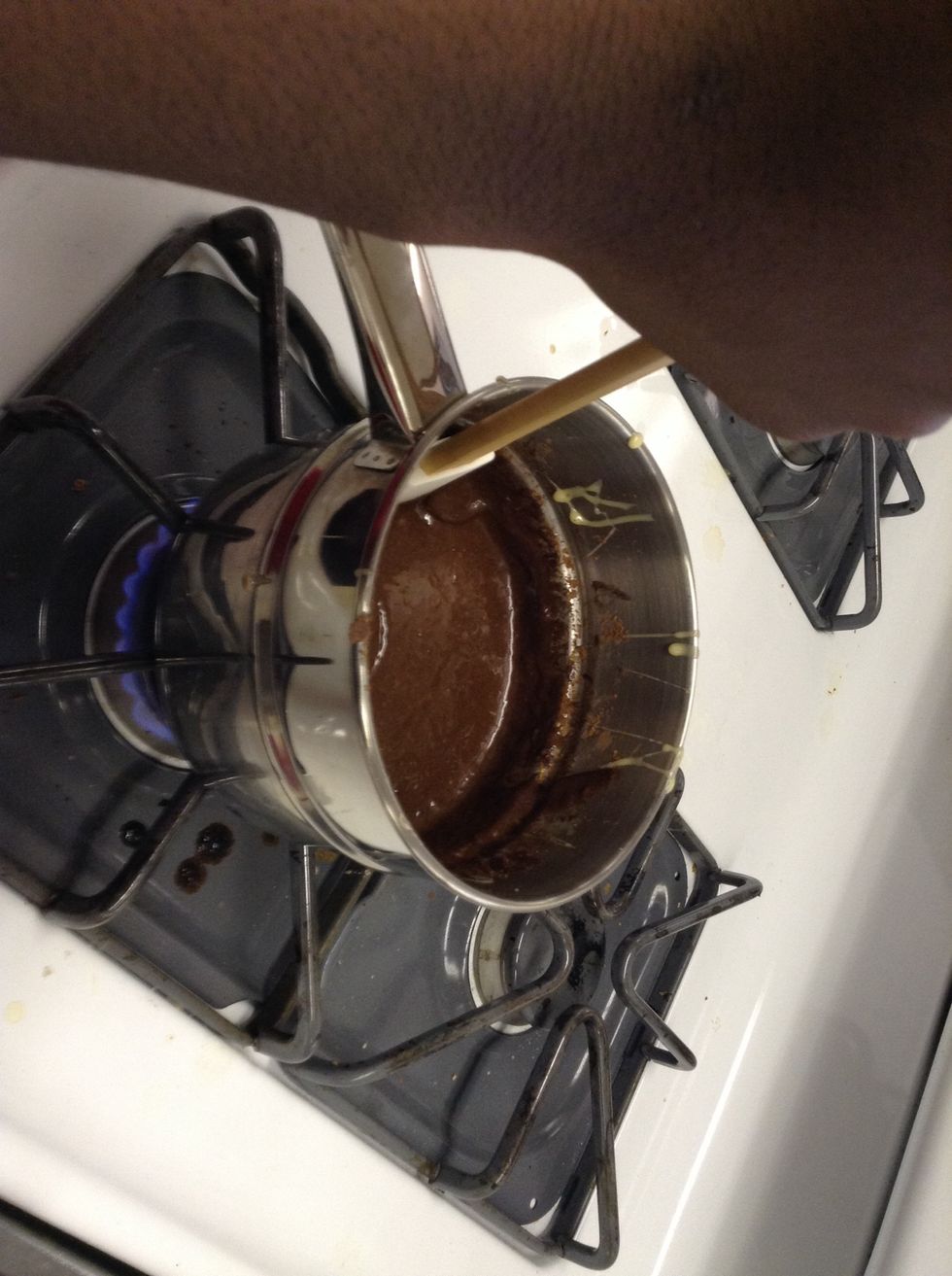 Combine cocoa powder and sweetened condensed milk