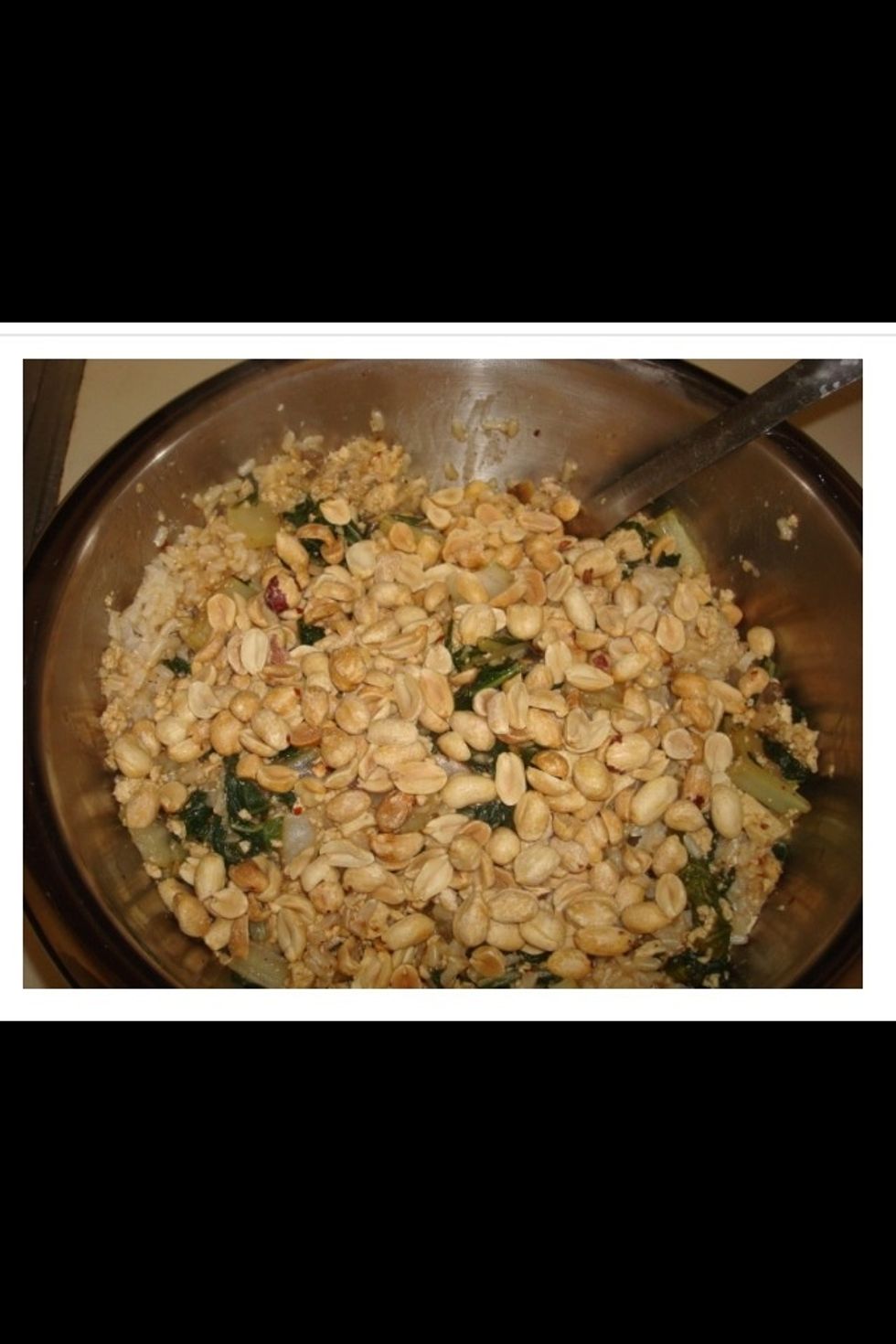 Combine cooked rice and vegetables in a large bowl and mix in about \u00bd cup of peanuts (or to taste).  Mix it all together and serve in individual bowls with low sodium soy sauce.