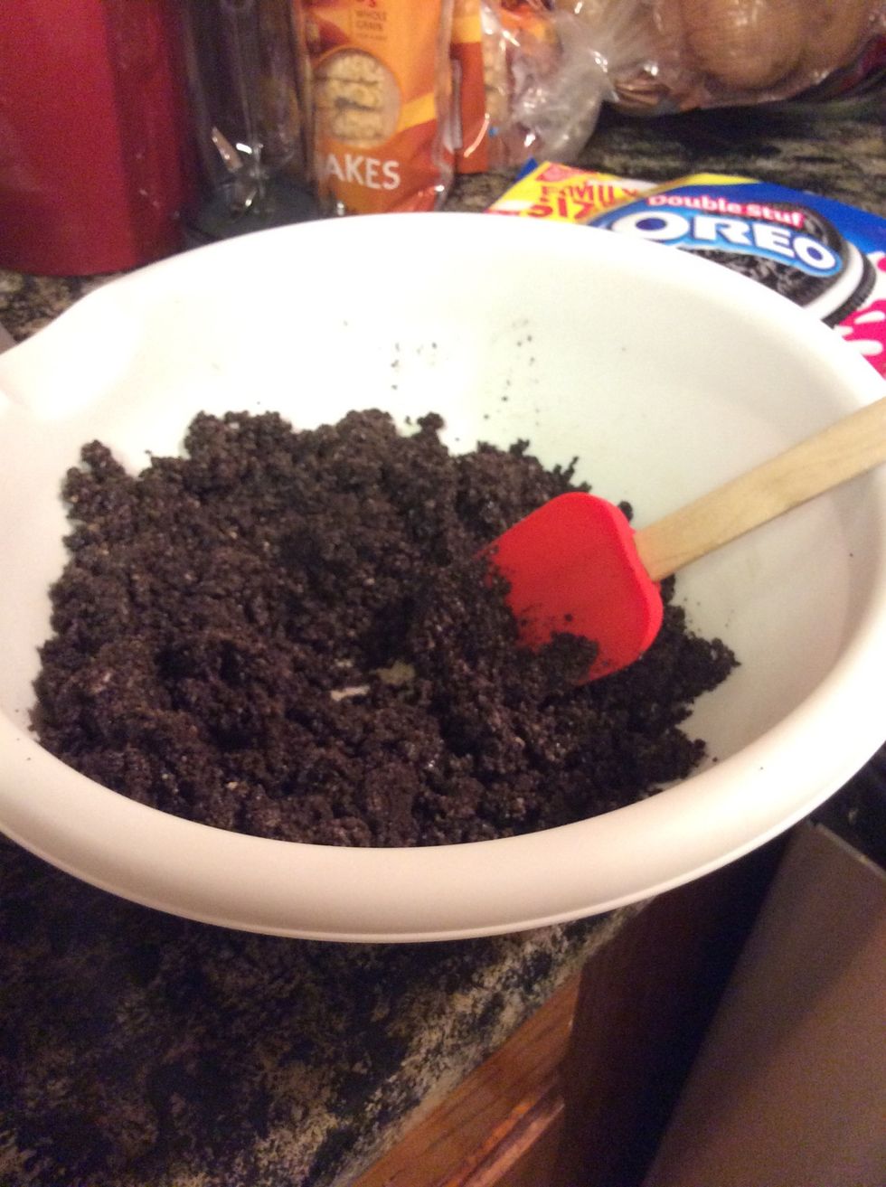 Combine crushed Oreos with the one stick of melted butter. Then press into pan.